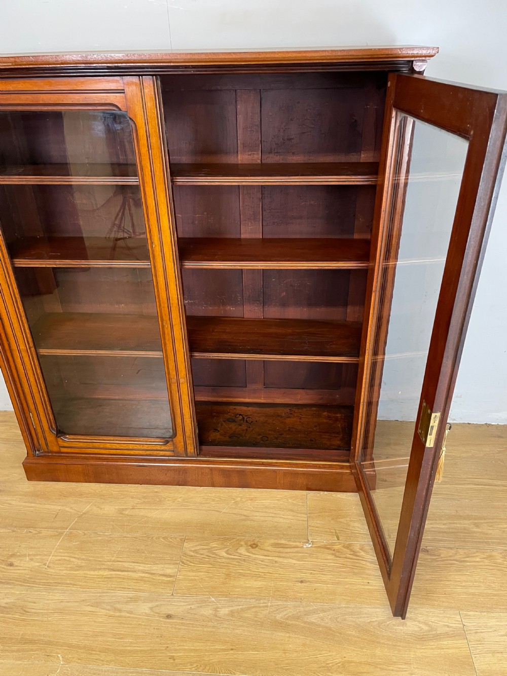 Arts and Crafts walnut freestanding glazed bookcase View XII