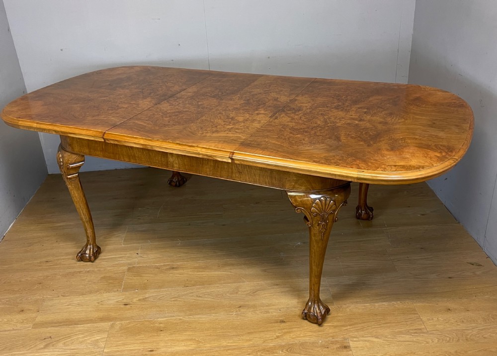 Burr walnut extending Queen Anne style six seater dining table  View II
