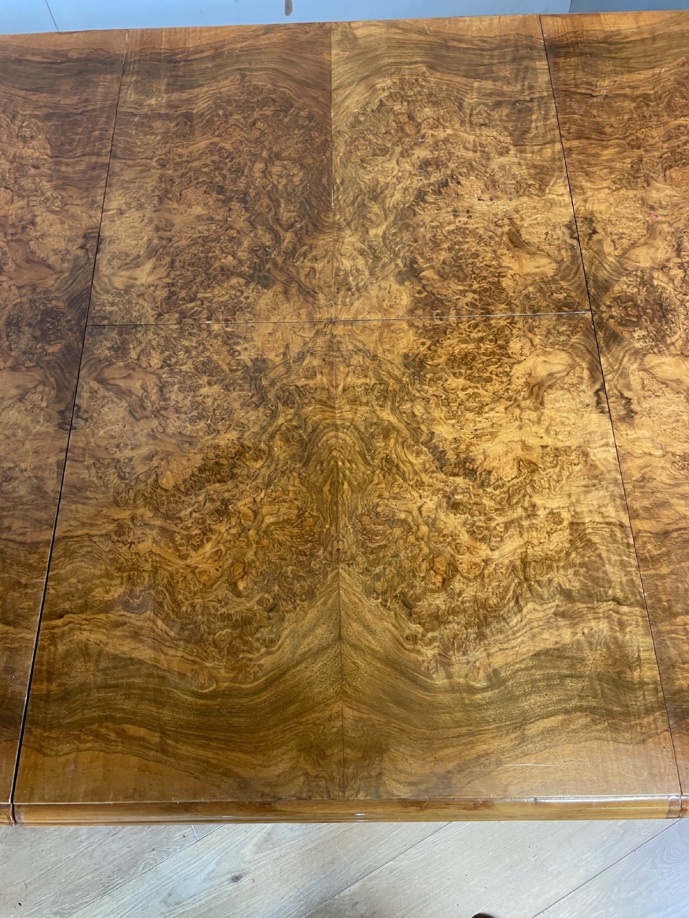 Burr walnut extending Queen Anne style six seater dining table  View V