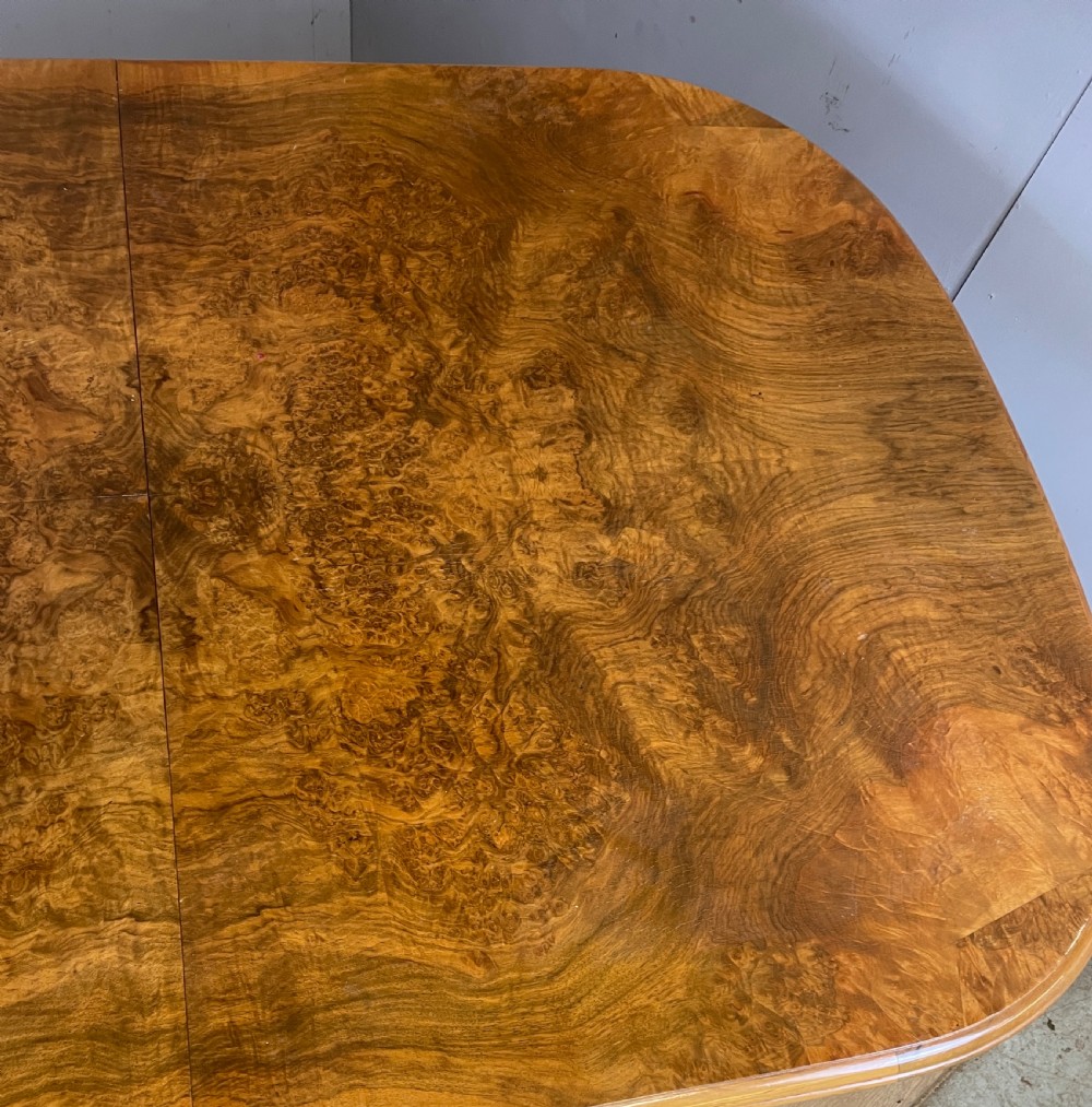 Burr walnut extending Queen Anne style six seater dining table  View VII