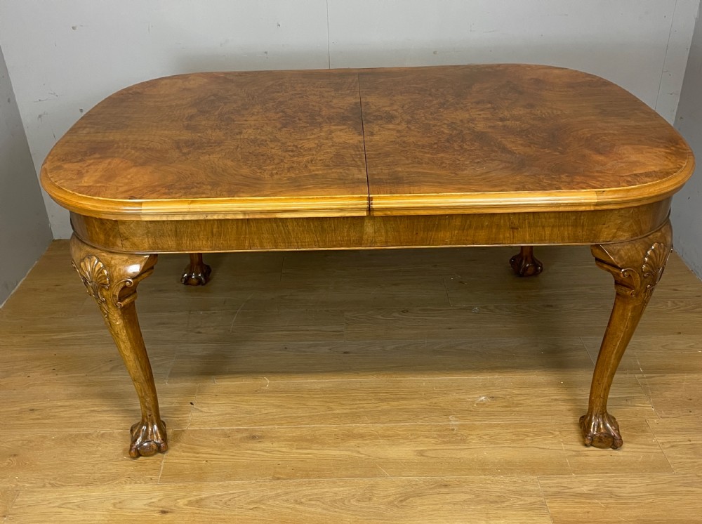 Burr walnut extending Queen Anne style six seater dining table  View XII