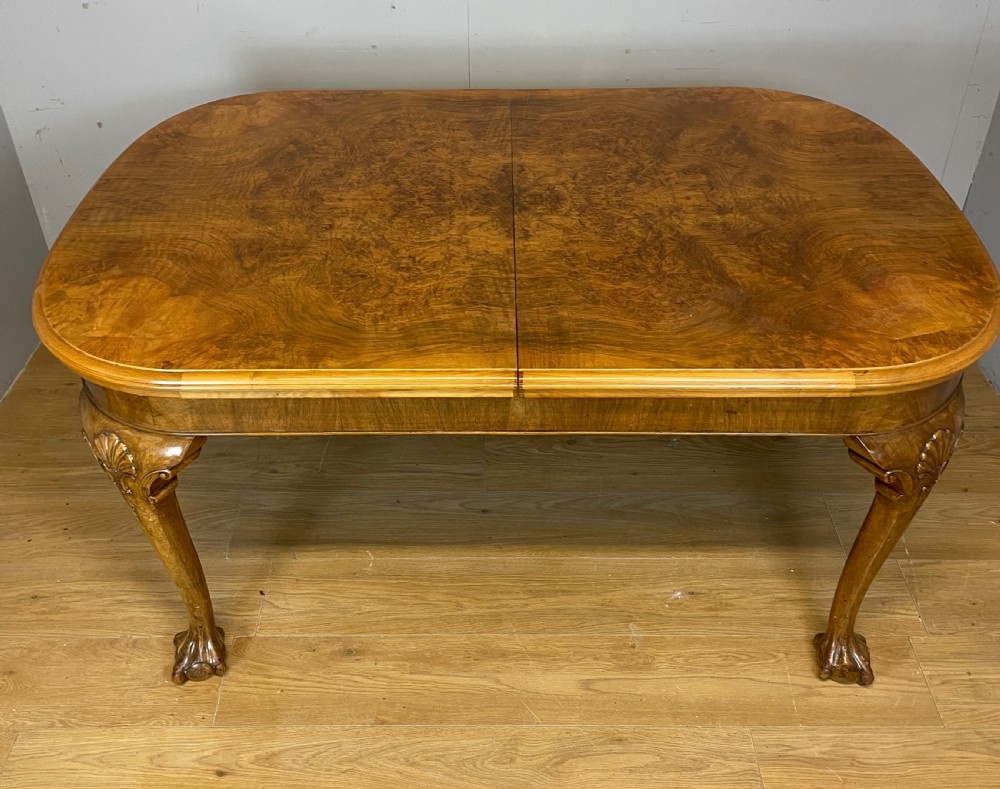Burr walnut extending Queen Anne style six seater dining table  View XIII