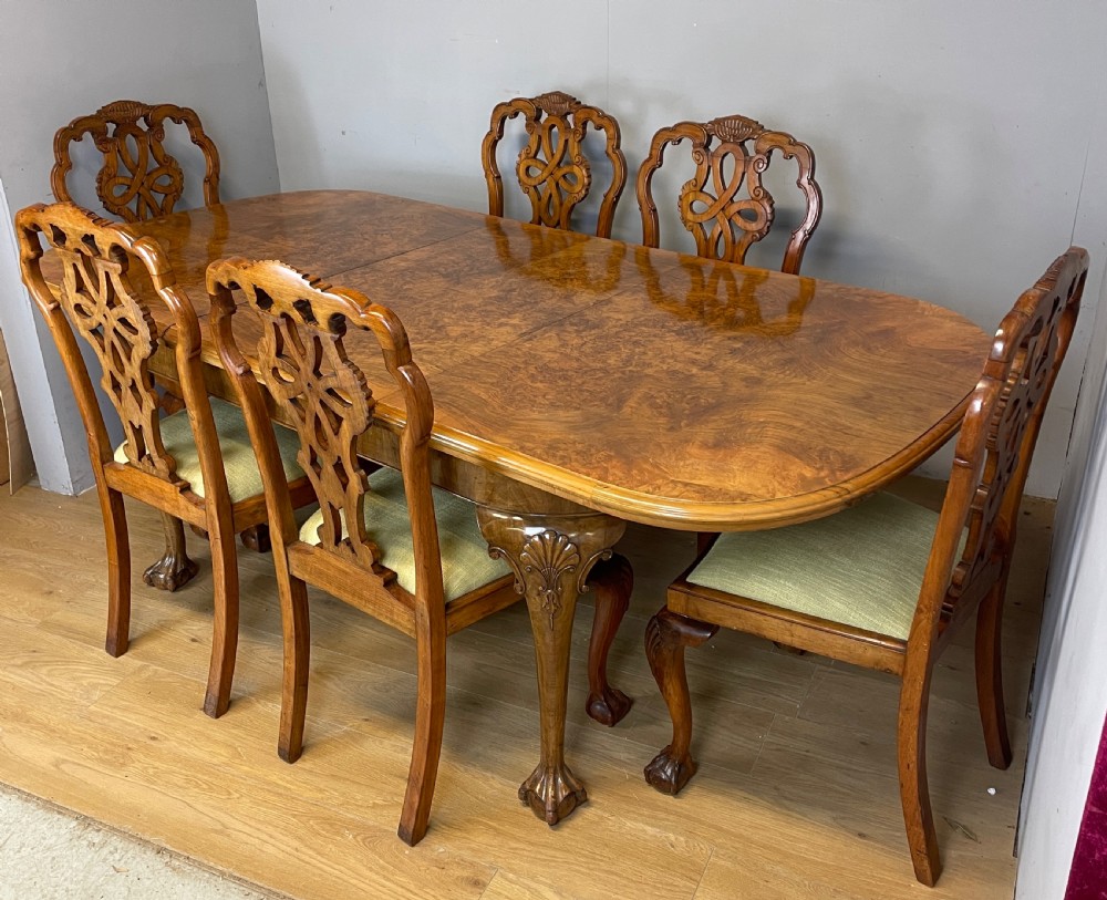 Burr walnut extending Queen Anne style six seater dining table  View XVII