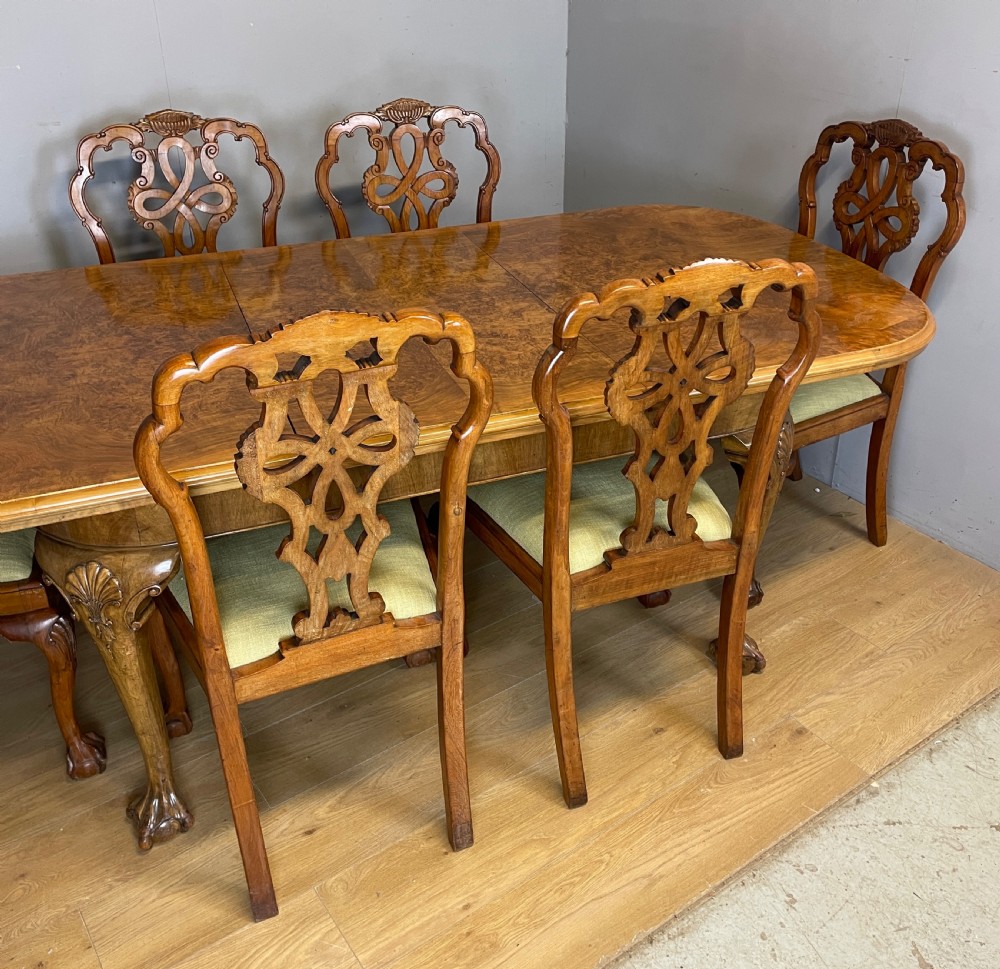 Burr walnut extending Queen Anne style six seater dining table  View XVIII