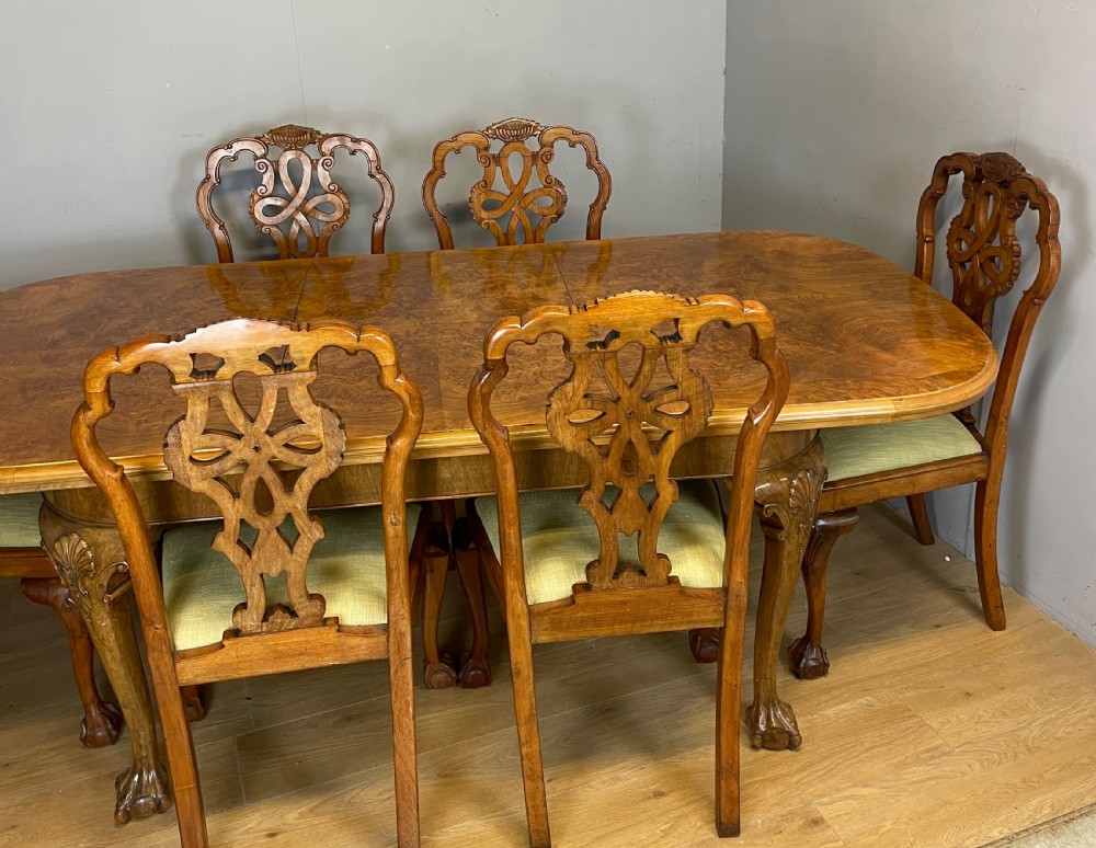 Burr walnut extending Queen Anne style six seater dining table  View XIX