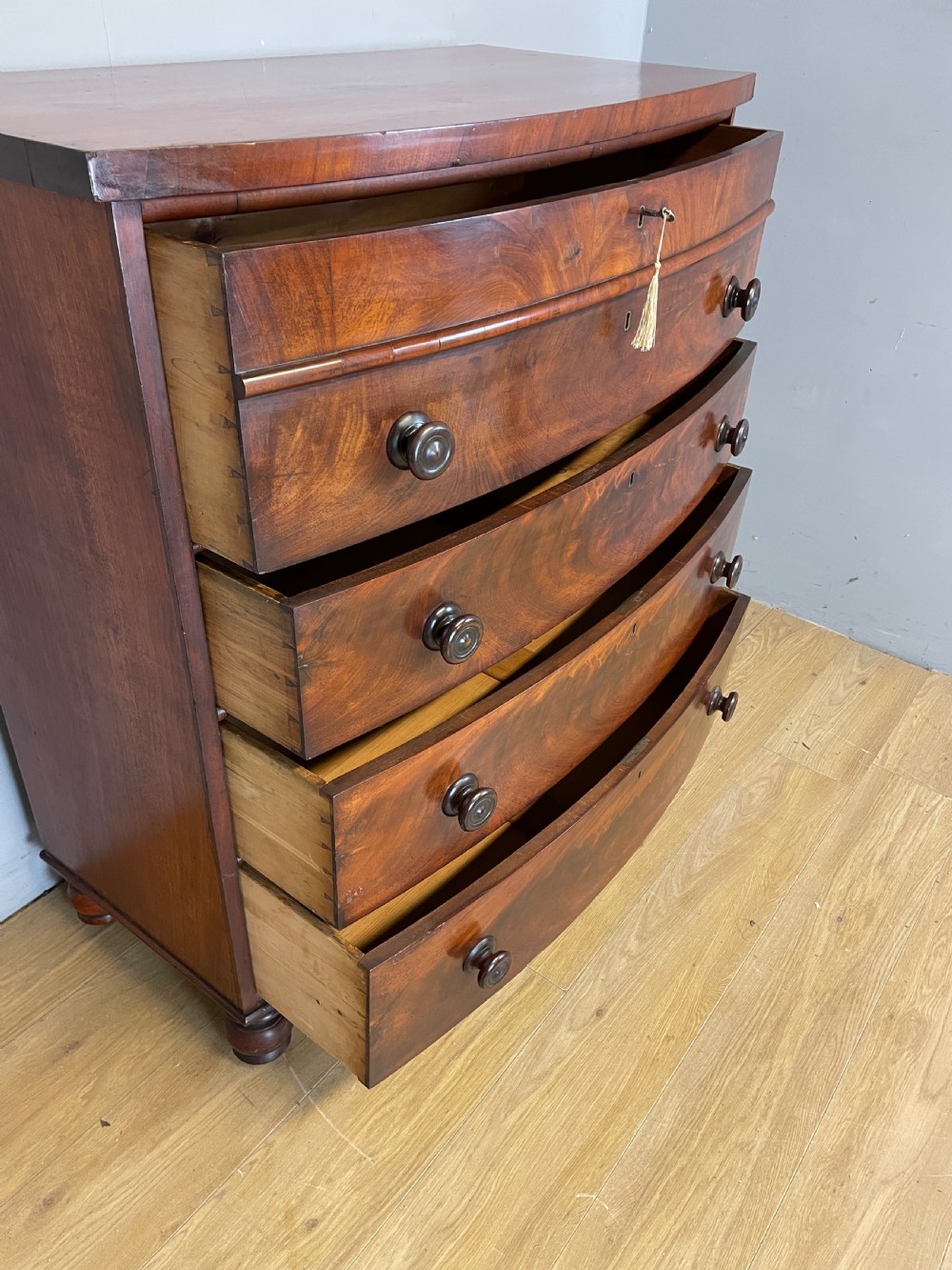 C19TH flame mahogany bow front 4 height chest of drawers circa 1870 View IV