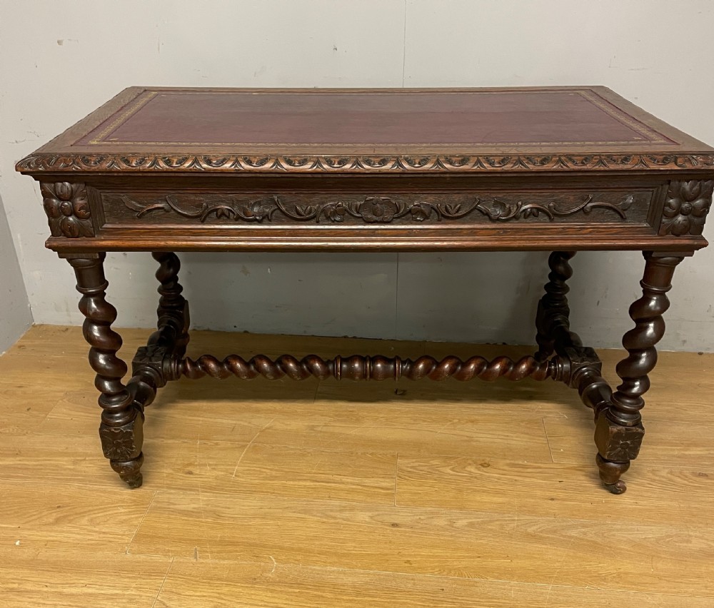 C19th Carved Oak Jacobean style writing Table With tooled leather top  View X