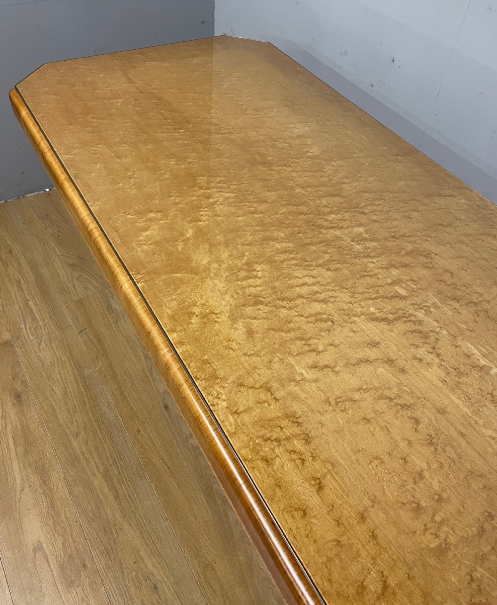 Art Deco walnut and Birds Eye maple dining table in the manner of Epstein  View VII