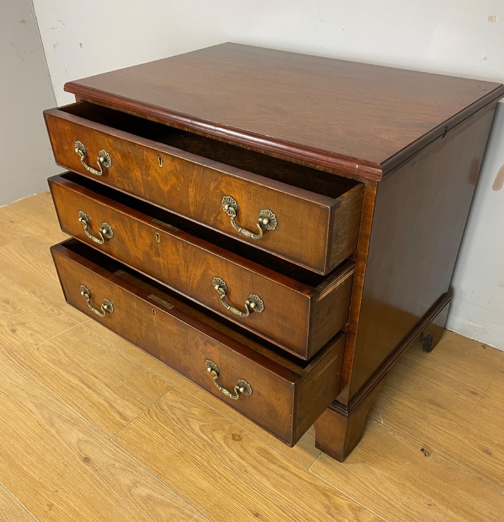 Small Edwardian three height flame mahogany chest of drawers  View IV