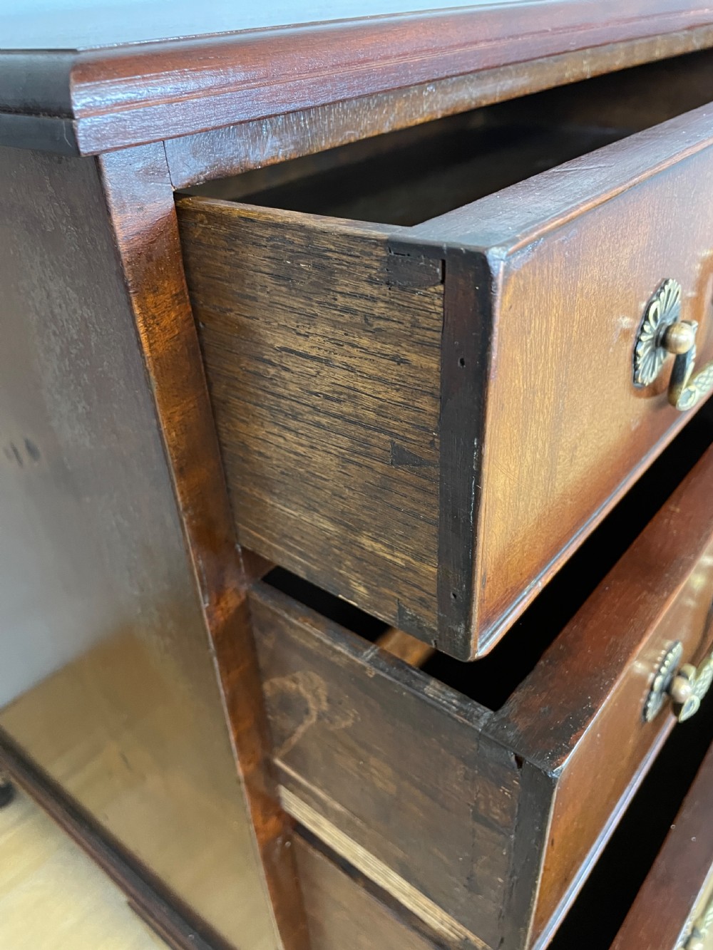 Small Edwardian three height flame mahogany chest of drawers  View V