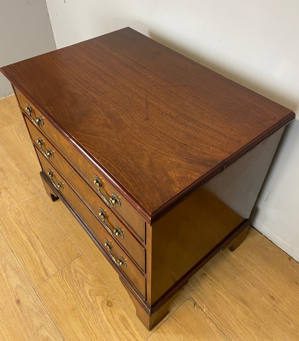 Small Edwardian three height flame mahogany chest of drawers  View VIII