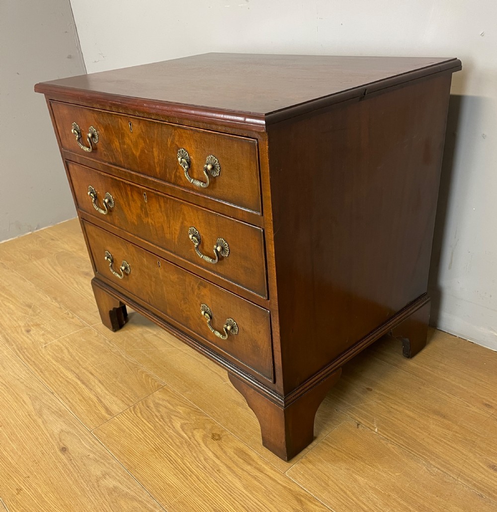 Small Edwardian three height flame mahogany chest of drawers  View IX