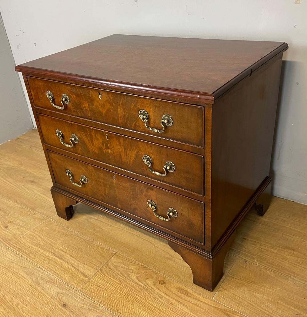 Small Edwardian three height flame mahogany chest of drawers  View X