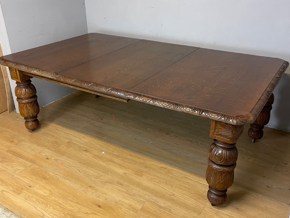 Oak eight seater wind out table in Jacobean style circa 1870