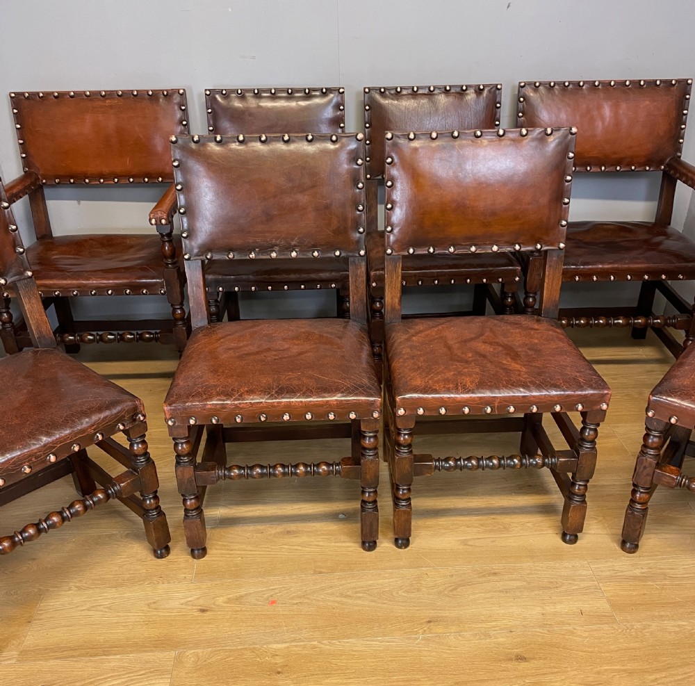 Eight Jacobean style leather and oak dining chairs circa 1890 View IV