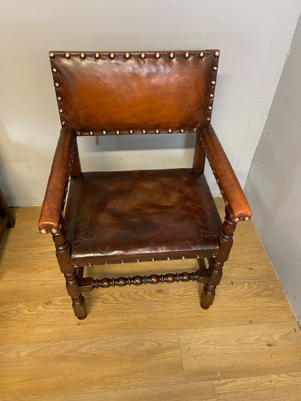 Eight Jacobean style leather and oak dining chairs circa 1890 View VII