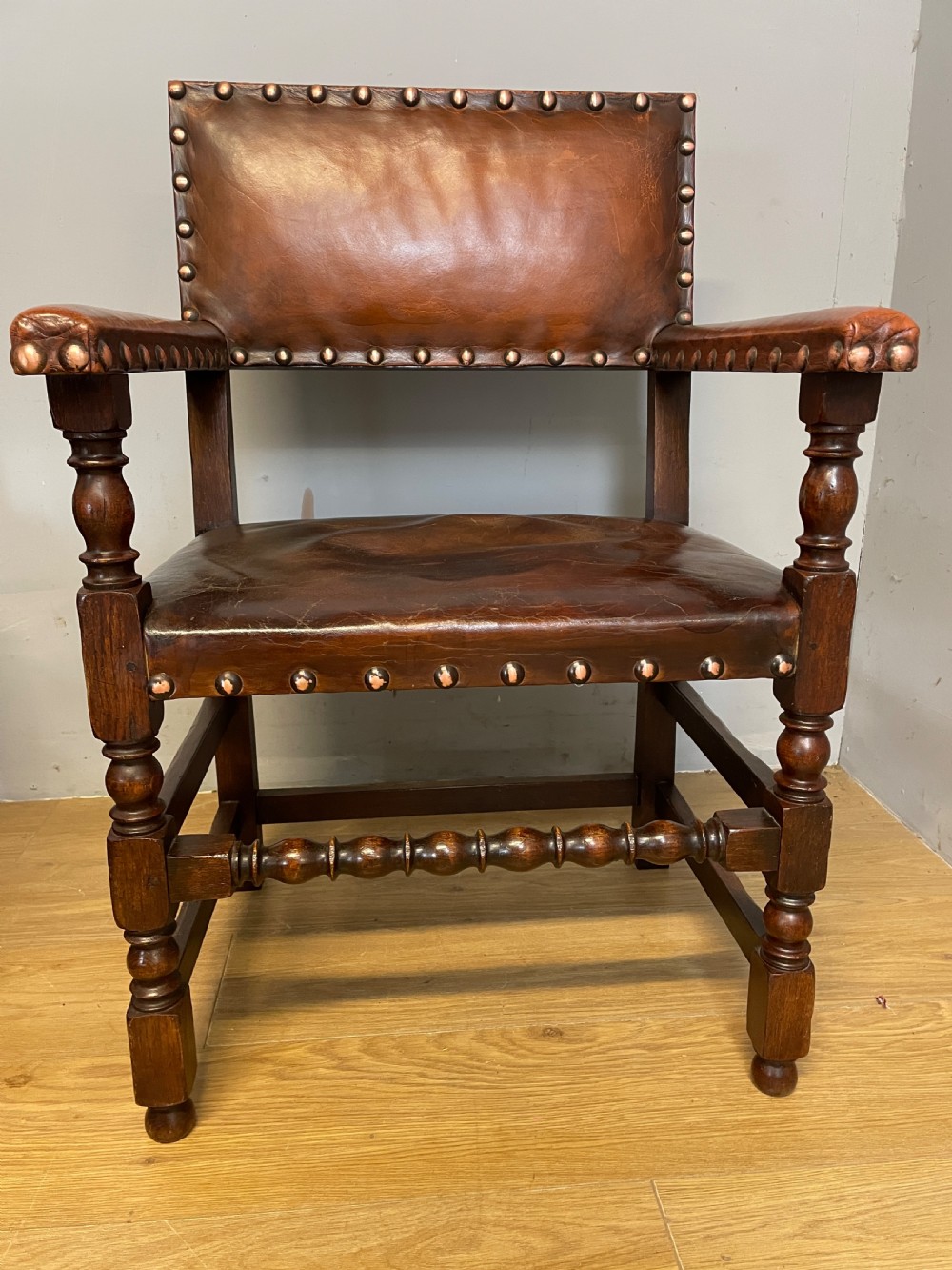 Eight Jacobean style leather and oak dining chairs circa 1890 View VIII