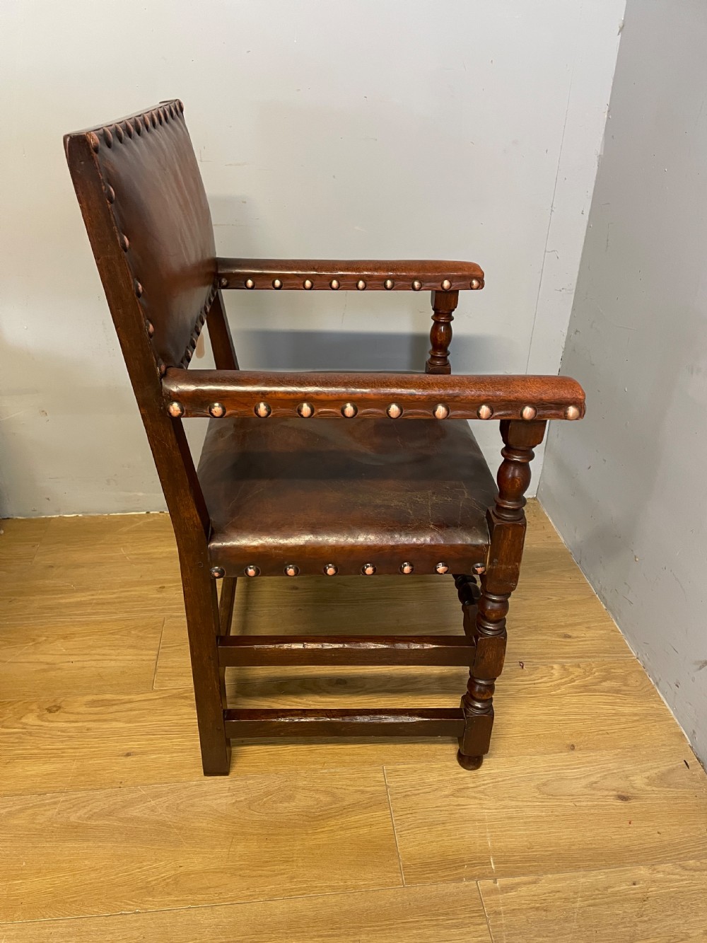Eight Jacobean style leather and oak dining chairs circa 1890 View IX