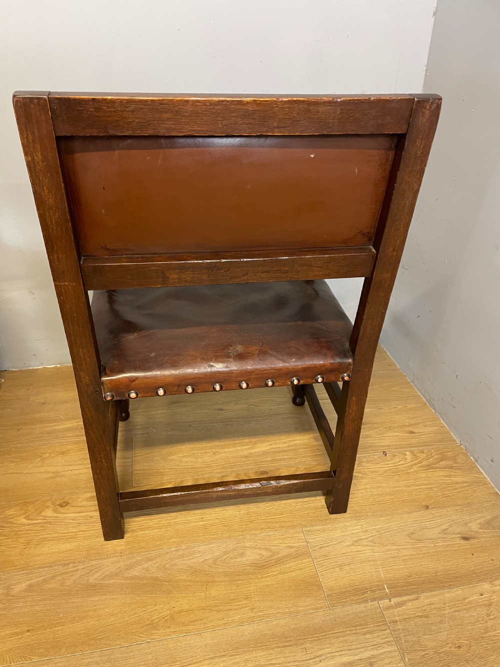 Eight Jacobean style leather and oak dining chairs circa 1890 View X