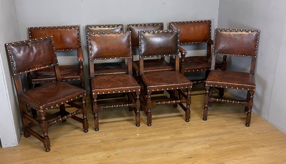 Eight Jacobean style leather and oak dining chairs circa 1890 View XIV