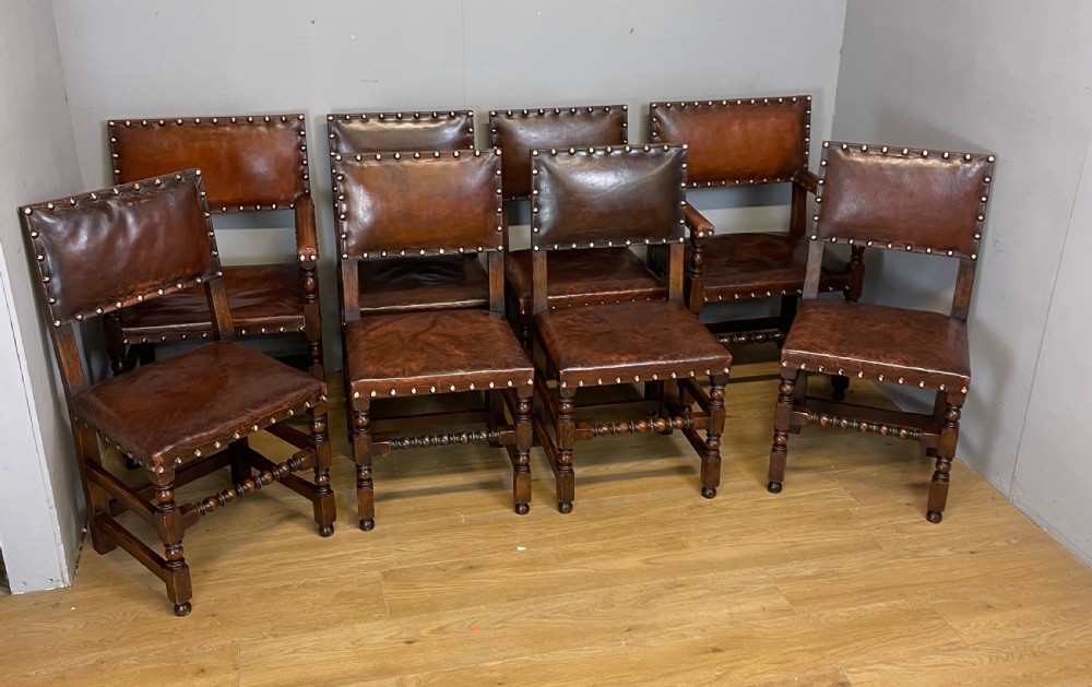 Eight Jacobean style leather and oak dining chairs circa 1890 View XV