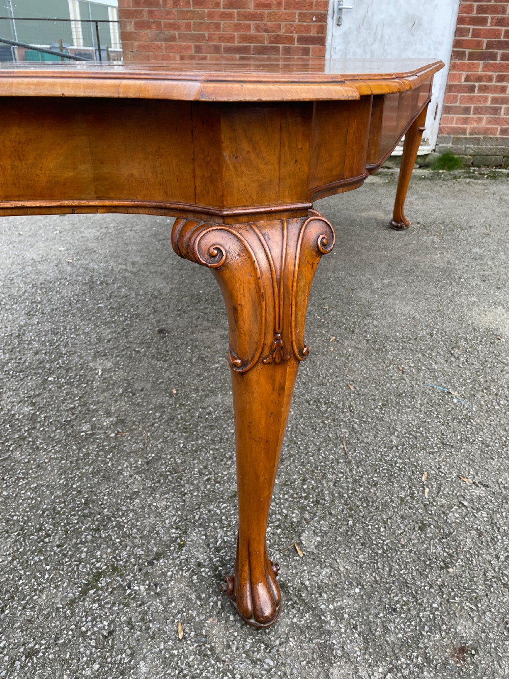 Burr walnut extending eight seater Queen Anne style dining table  View III