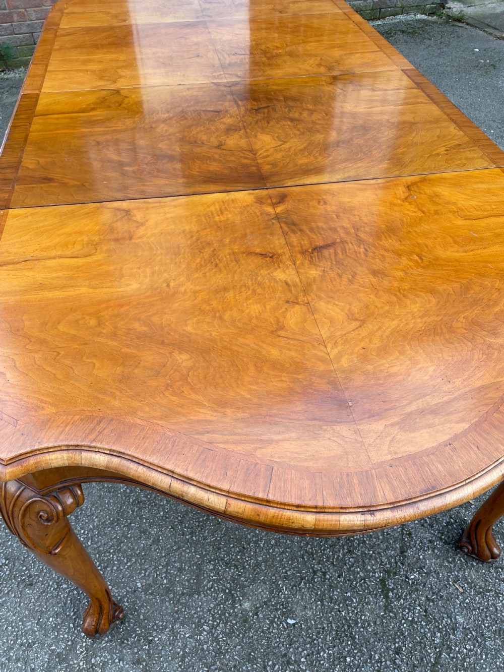 Burr walnut extending eight seater Queen Anne style dining table  View IV