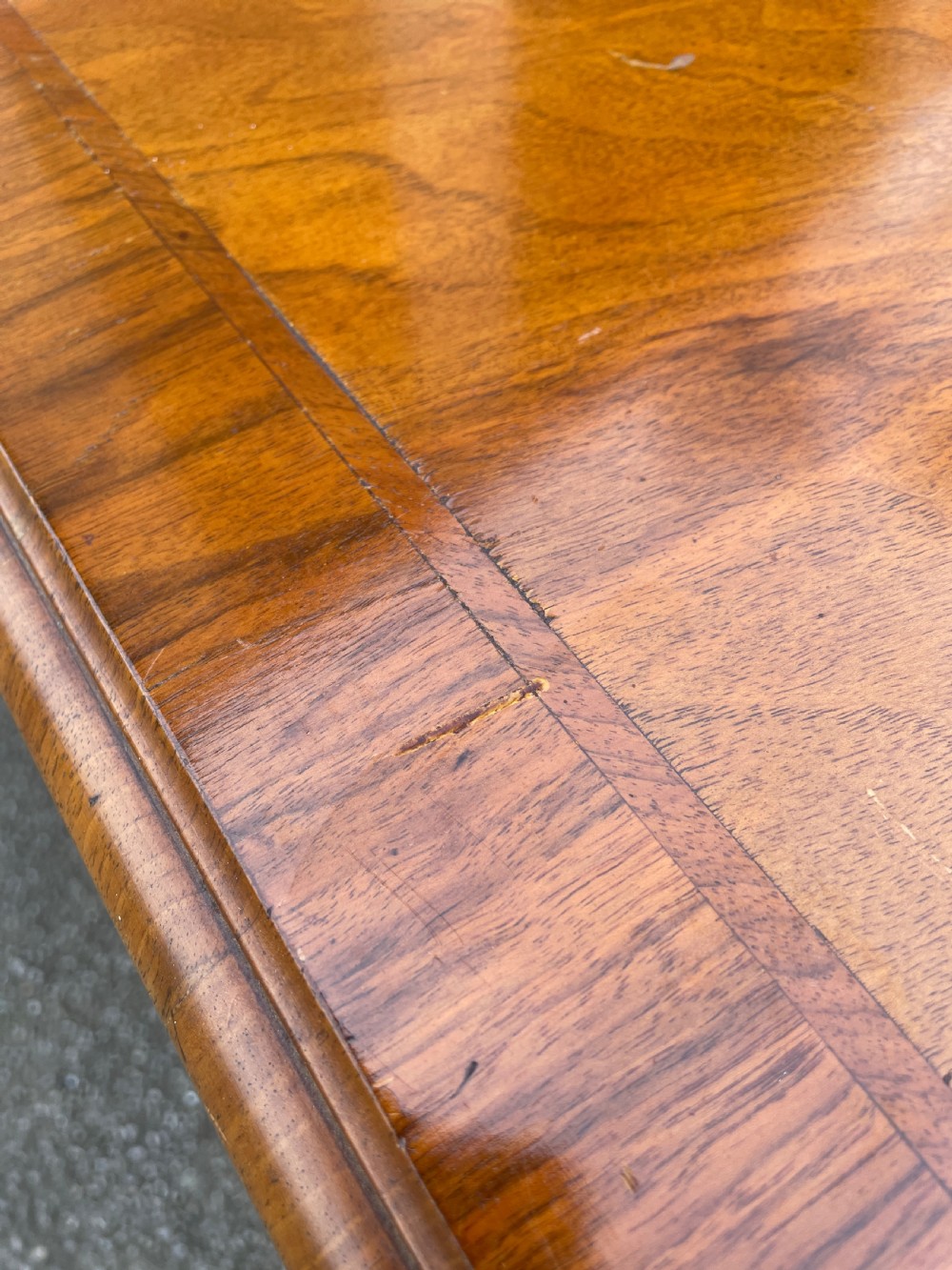 Burr walnut extending eight seater Queen Anne style dining table  View VII