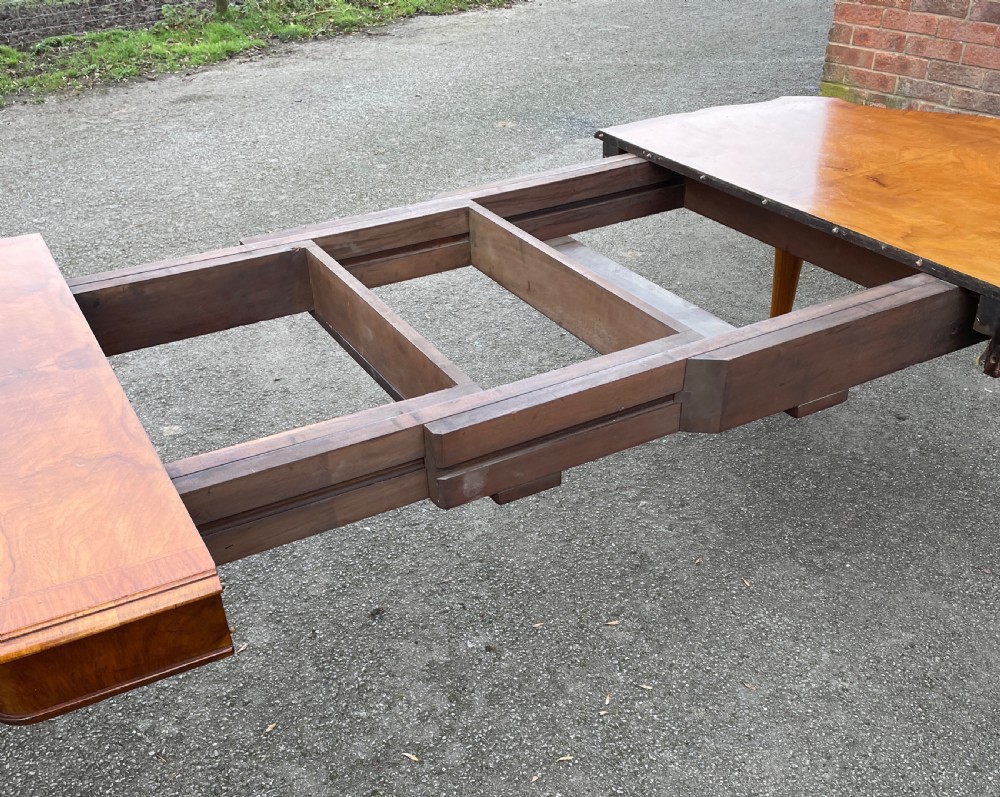 Burr walnut extending eight seater Queen Anne style dining table  View VIII