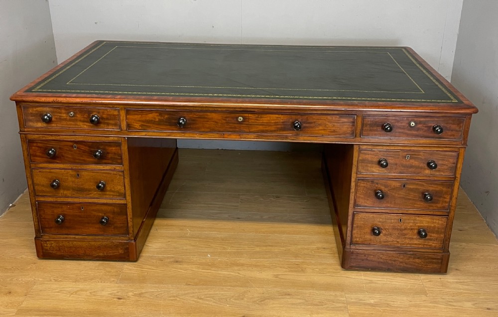 C19TH mahogany partners desk with inset tooled leather top  View II
