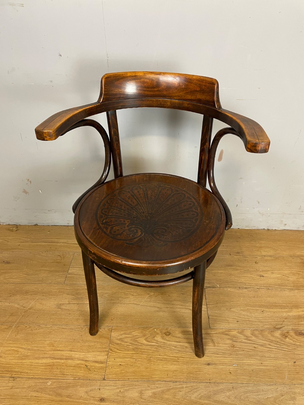 Bentwood armchair in original condition- shell motif seat 