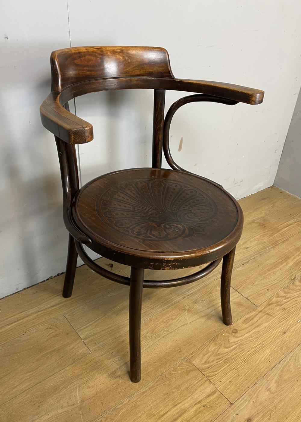 Bentwood armchair in original condition- shell motif seat  View II