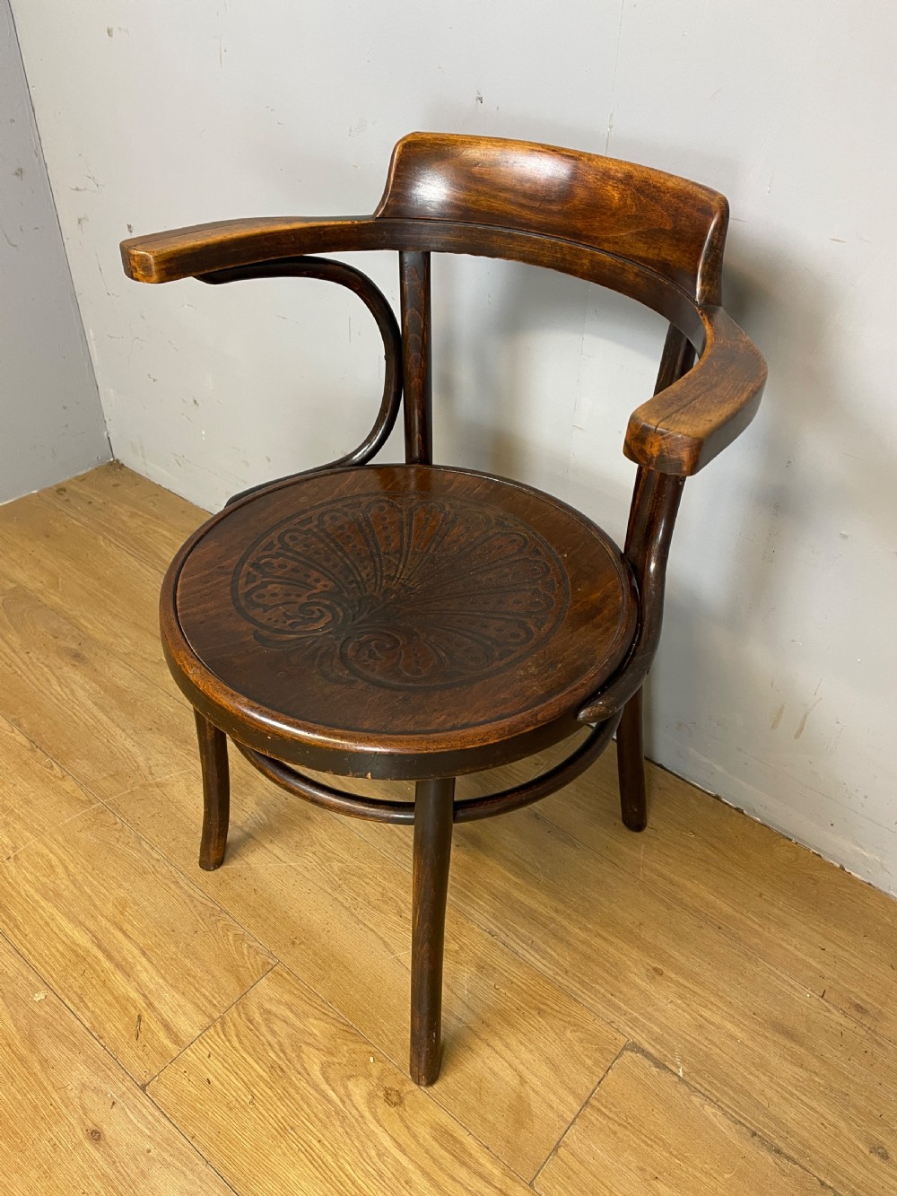 Bentwood armchair in original condition- shell motif seat  View V