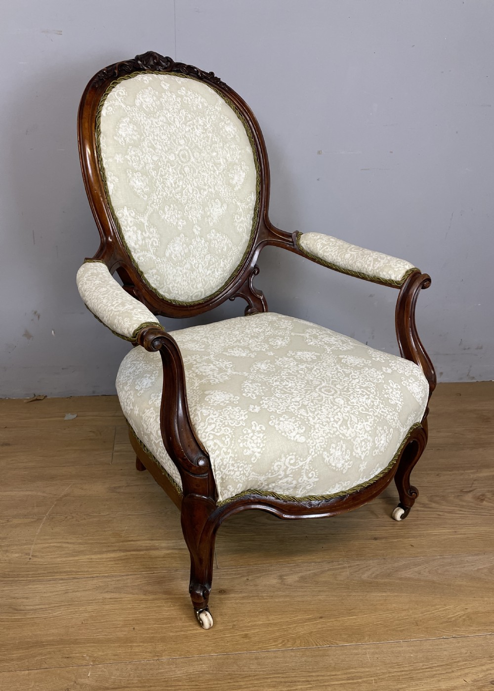 C19TH carved walnut spoon back open armchair