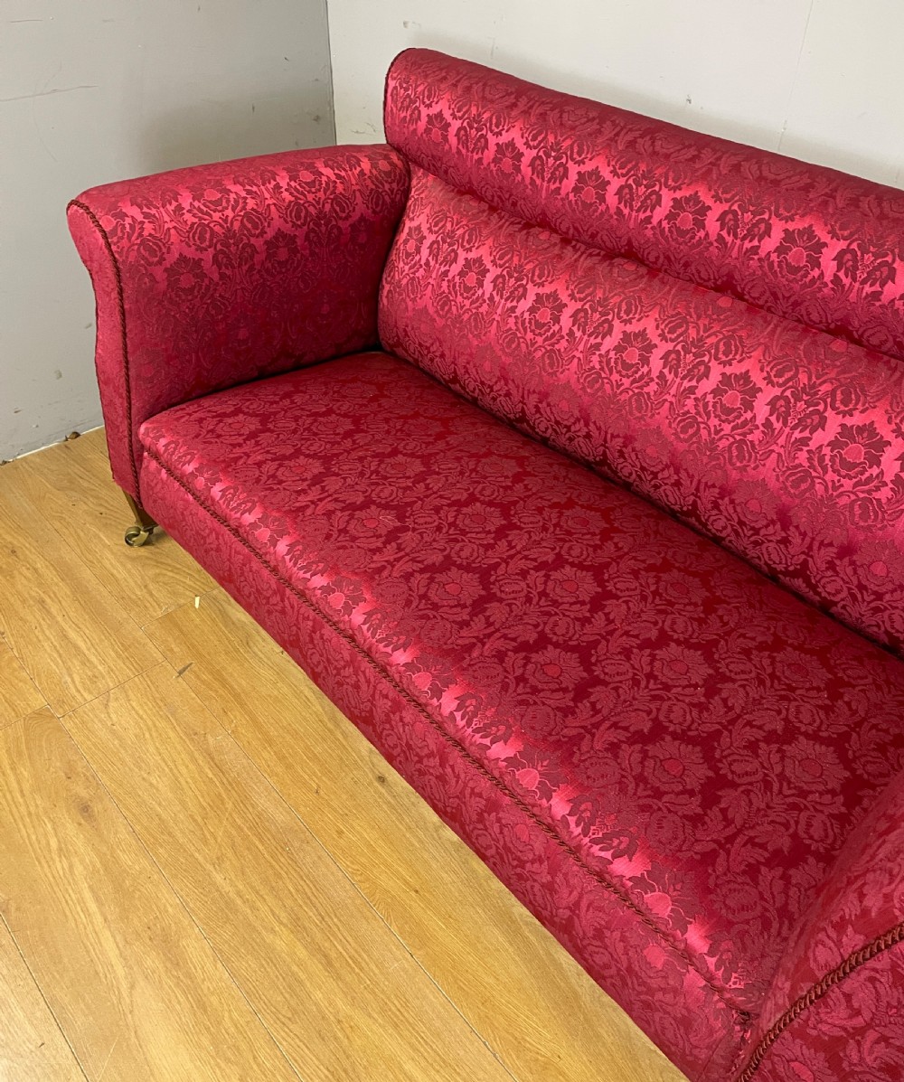 C19TH country house sofa with drop arm mechanism  View III