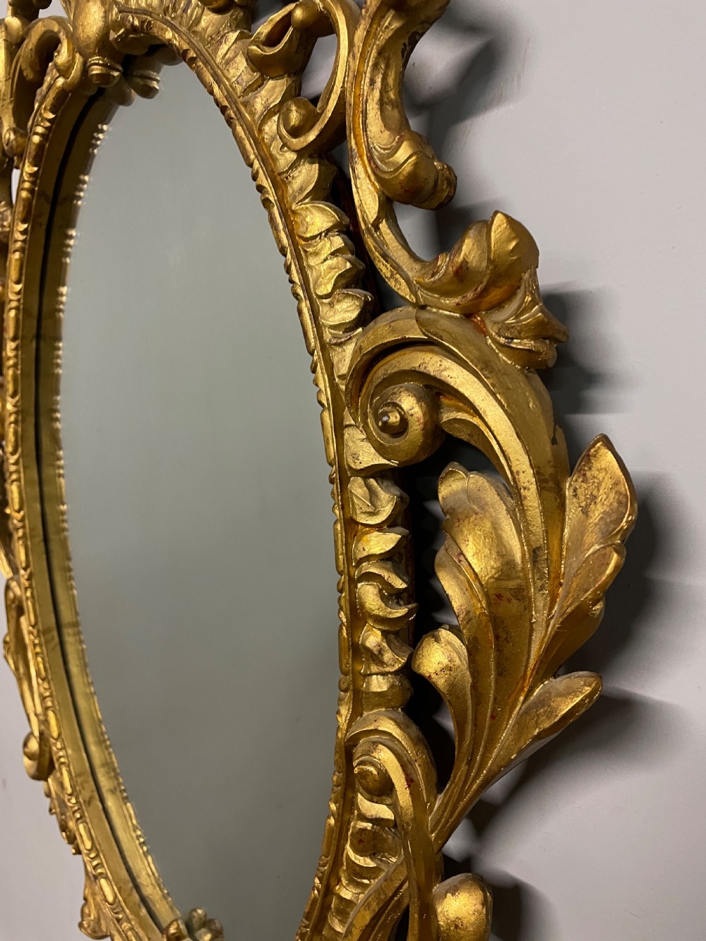 Early C20th carved giltwood wall mirror  View VII