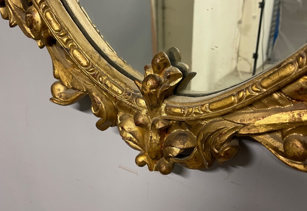 Early C20th carved giltwood wall mirror  View VIII