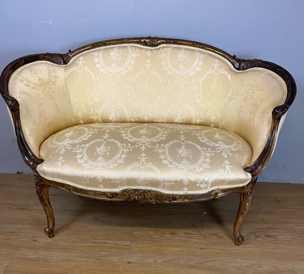 C19TH French Louis XV style carved walnut framed settee