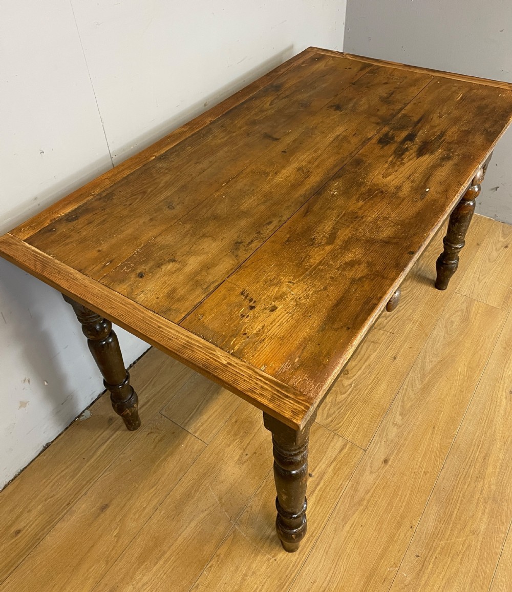 C19TH rustic pine table with two drawers  View III