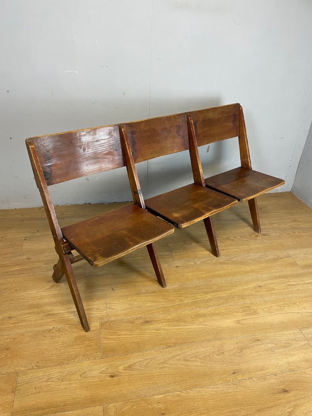 Golden oak folding three seater chapel seat circa 1930