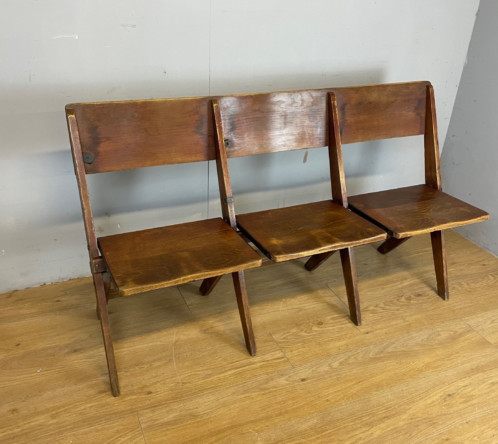 Golden oak folding three seater chapel seat circa 1930 View II