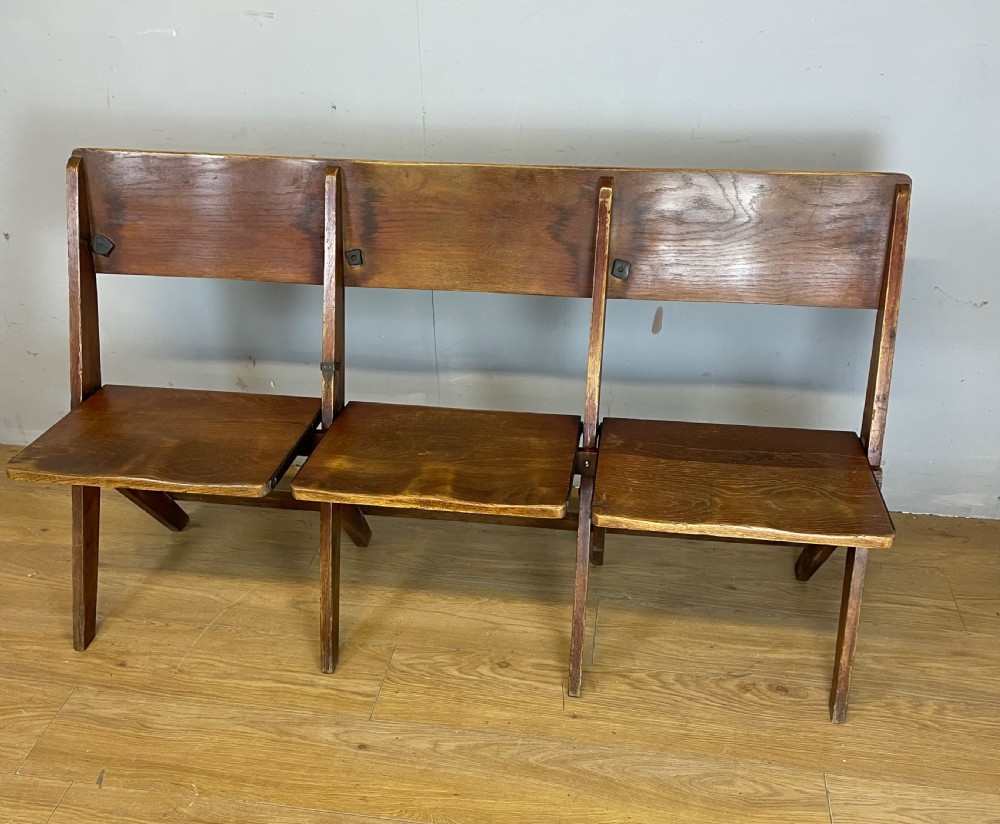 Golden oak folding three seater chapel seat circa 1930 View III