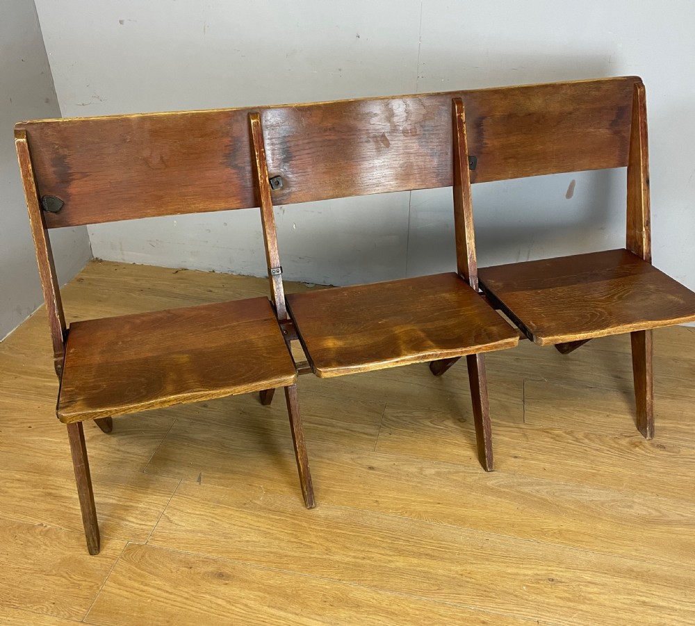 Golden oak folding three seater chapel seat circa 1930 View X
