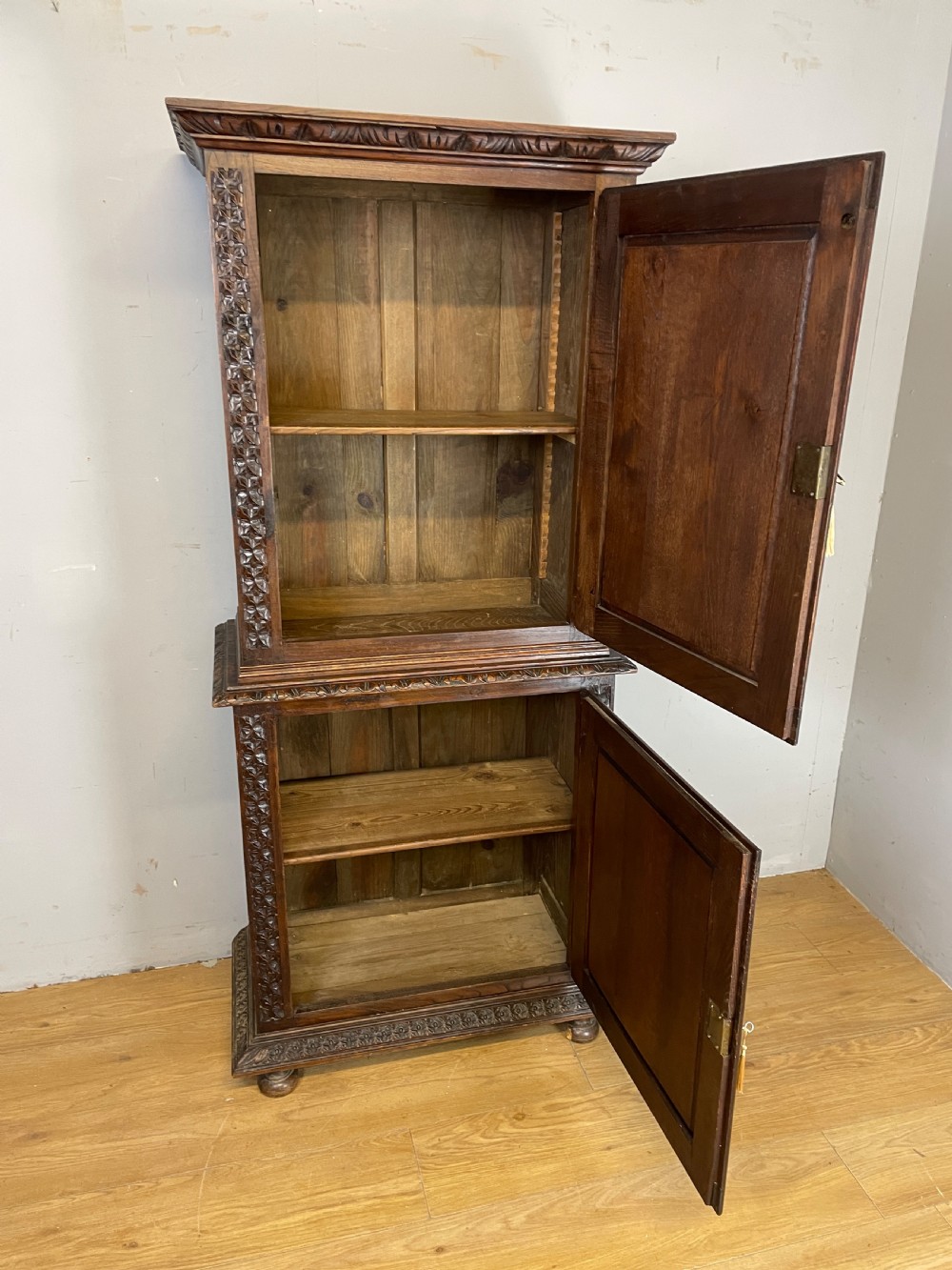 C19TH carved oak continental two door cupboard  View IV