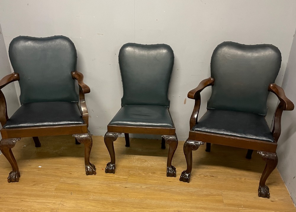 Set of 10 Edwardian mahogany framed dining chairs in blue leather on carved cabriole legs  View II