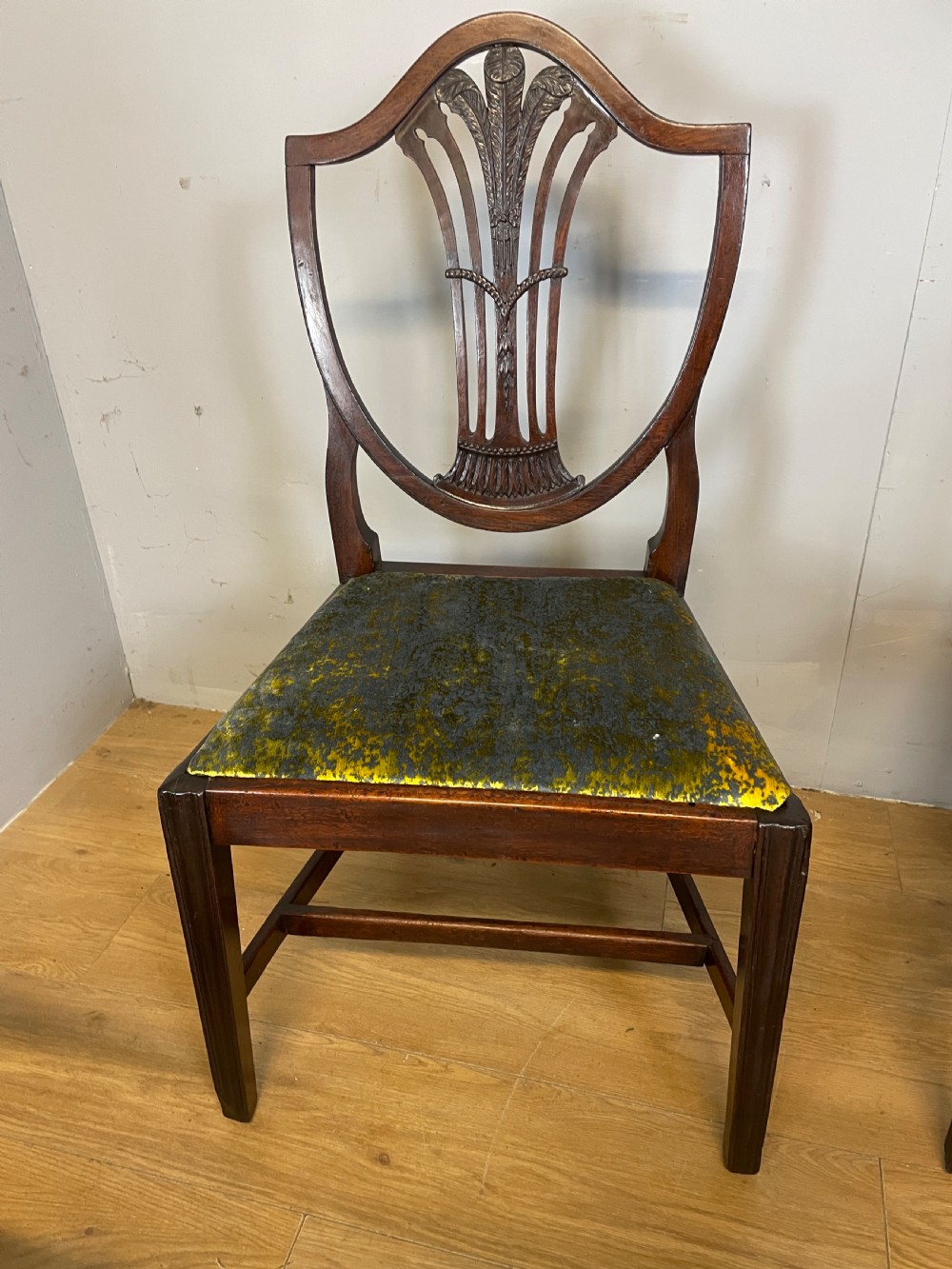 Set of eight Georgian mahogany shield back dining chairs including two armchairs with carved splats and patterned upholstered seats. View VIII