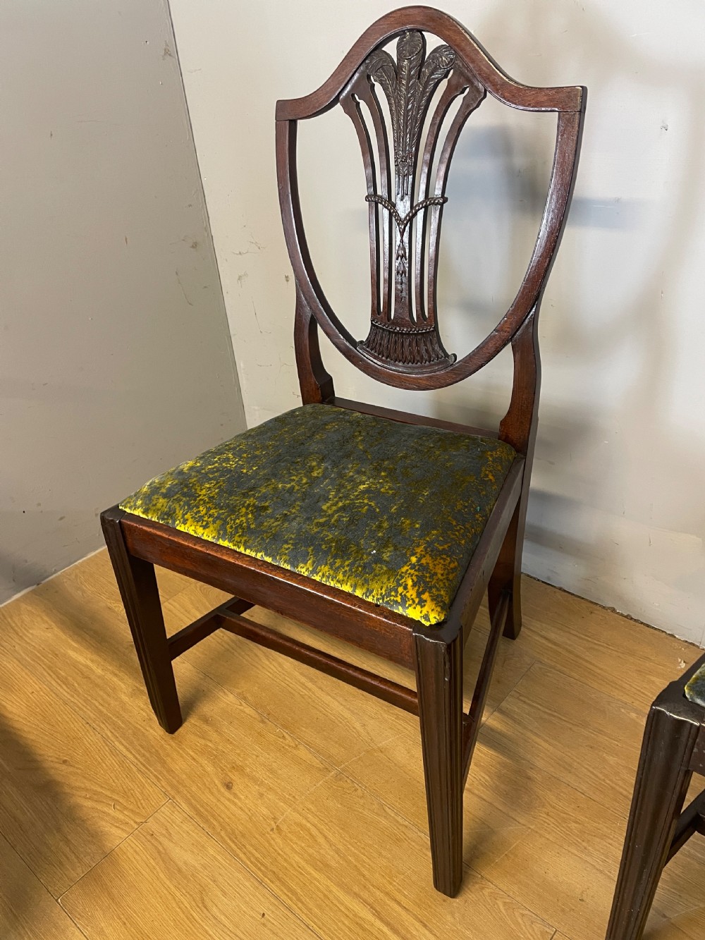 Set of eight Georgian mahogany shield back dining chairs including two armchairs with carved splats and patterned upholstered seats. View IX