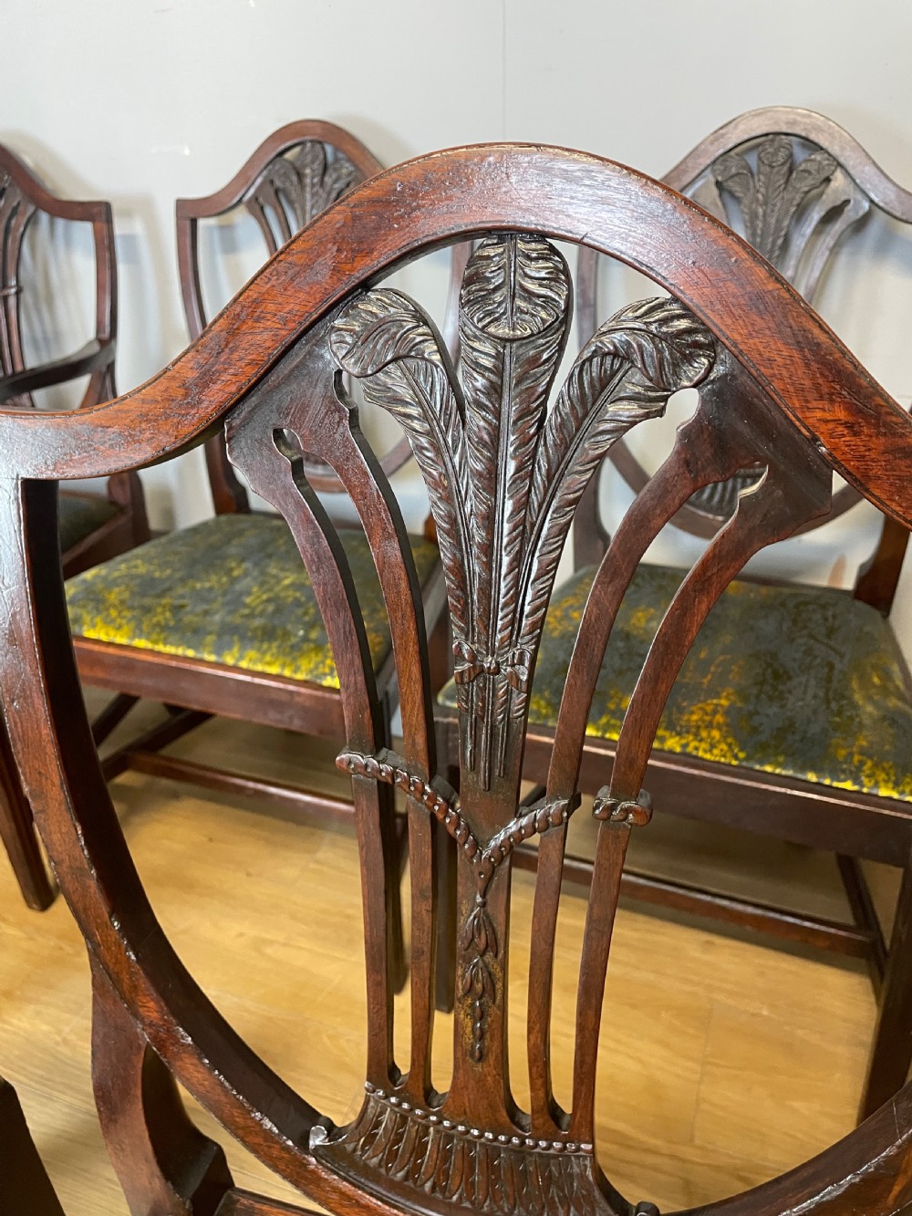Set of eight Georgian mahogany shield back dining chairs including two armchairs with carved splats and patterned upholstered seats. View XV
