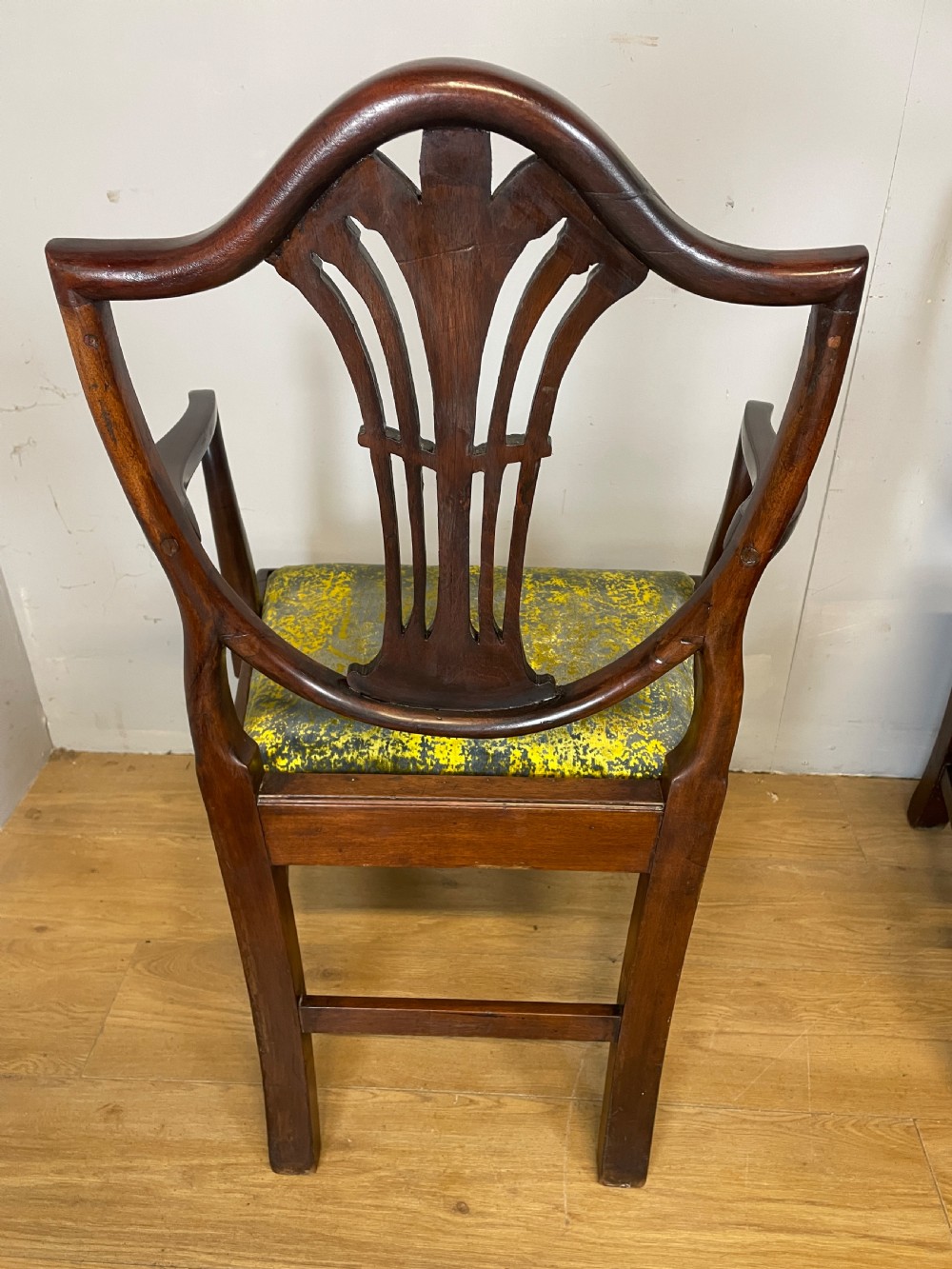 Set of eight Georgian mahogany shield back dining chairs including two armchairs with carved splats and patterned upholstered seats. View XVI