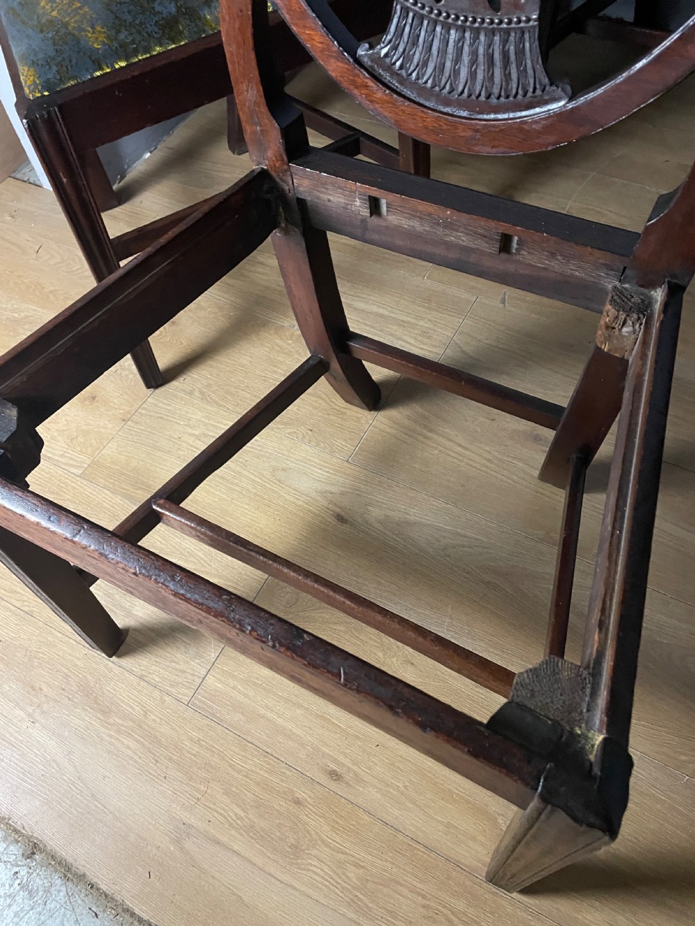Set of eight Georgian mahogany shield back dining chairs including two armchairs with carved splats and patterned upholstered seats. View XVII